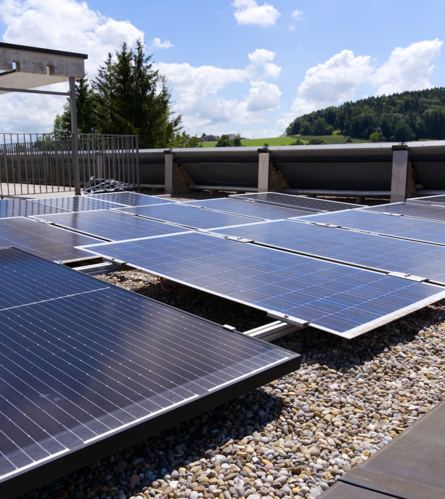 Solar panels on rooftop at village Forch, Canton Zürich, on a sunny summer day. Photo taken June 10th, 2022, Forch, Switzerland.